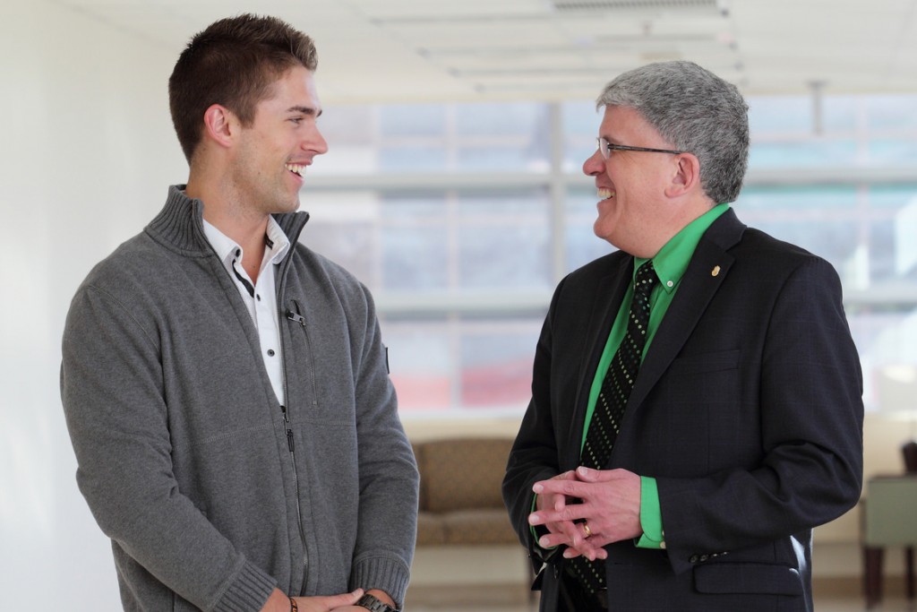Zach VanderWeide poses for a photo with Dr. James Fahner.