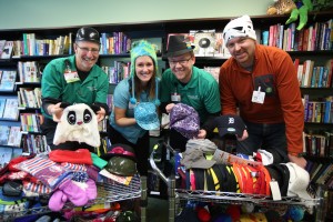 Spectrum Health employees pose for a photo with hats from The Happy Hatter, a community outreach program, at Spectrum Health Helen DeVos Children's Hospital.