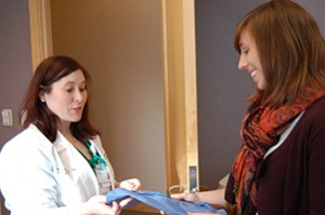 Spectrum Health Vein Center practice manager Chelsea Schrot and certified sclerotherapy nurse Sarah Minger are shown.