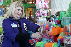 Cindi Walker organizes the Butterworth Hospital gift shop.