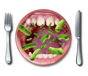 An illustration of a mouth eating green germs is shown.