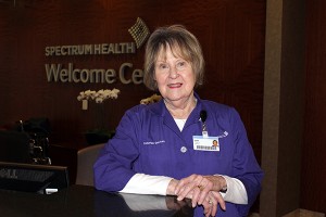 Jackie Zagers poses for a photo at a Spectrum Health Welcome Center.
