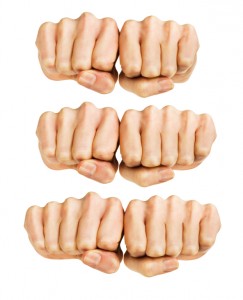 Three sets of hands are shown giving fist pumps.