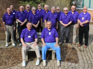 Spectrum Health Gerber Memorial valets are shown wearing purple shirts.