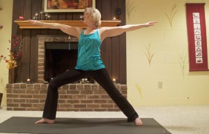 Spectrum Health yoga instructor Denise Karsen participates in yoga.