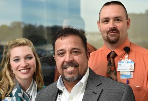 Army veteran David Decouto and Air Force veteran Gary Groom pose for a photo wtih with Spectrum Health’s Inclusion and Diversity manager Kristin Ekkens. 