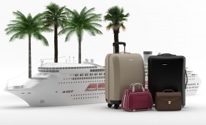 A few travel briefcases are shown in front of a cruise ship.
