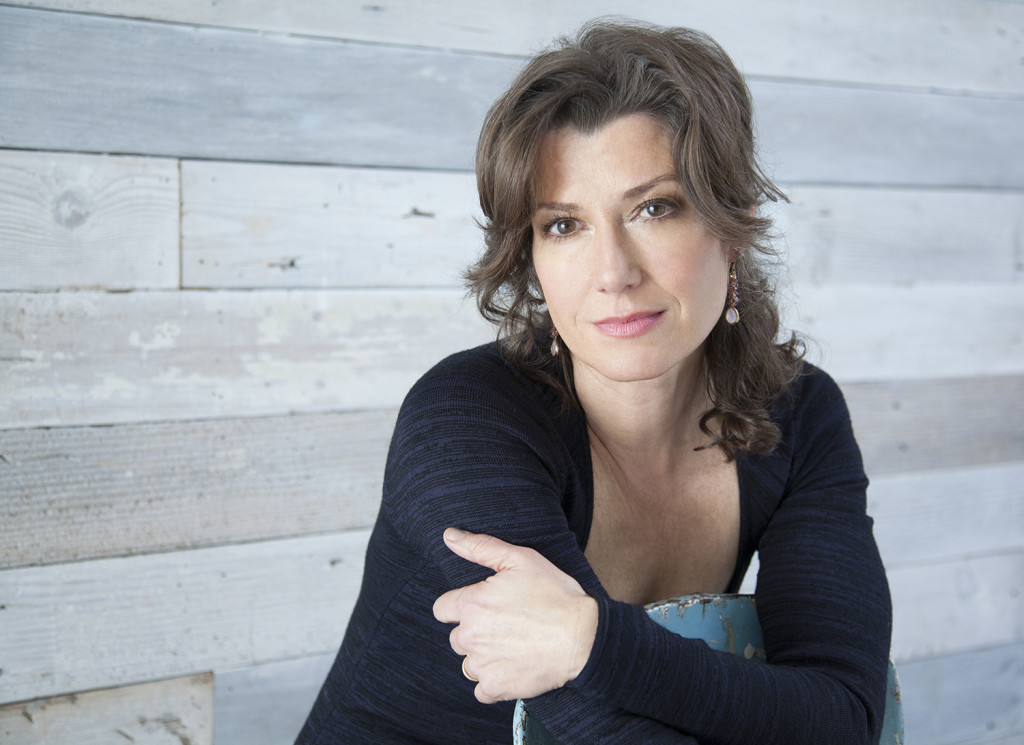 Amy Grant poses for a photo and smiles.