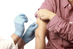 A person gets a vaccine.