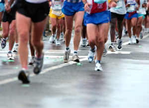 A group of ultramarathon runners race each other.