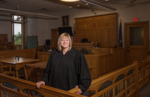 Susan K. Sniegowski, 51st Circuit Judge, stands in the courtroom at the Mason County Courthouse.