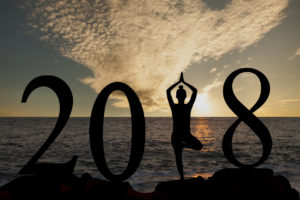 The words 2018 is shown in front of an ocean.