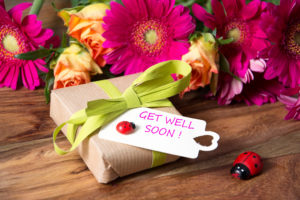 A "Get Well Soon!" gift is shown next to a Ladybug.