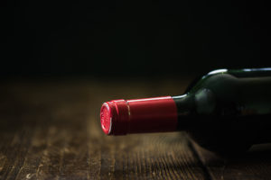 A bottle of wine is shown.