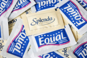 Splenda and Equal sweetener packets.