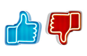 A blue thumbs up icon is placed next to a red thumbs down icon.