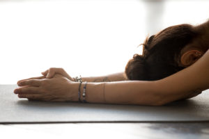 A woman participates in yoga.