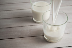 Two glasses of milk are shown.