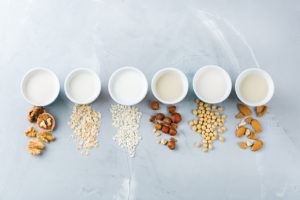 A wide variety of dairy-free milk options are shown.