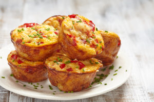 Egg muffins are shown on a white plate.