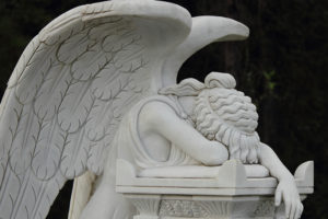 A statue is shown that symbolizes the loss of loved ones from the pandemic.