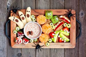 A plate full of Halloween-decorated treats